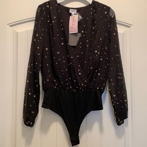 NWT Le Lis black with gold stars bodysuit.